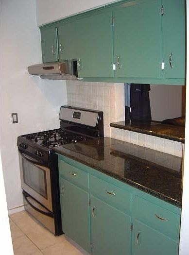 Kitchen with gas stove.