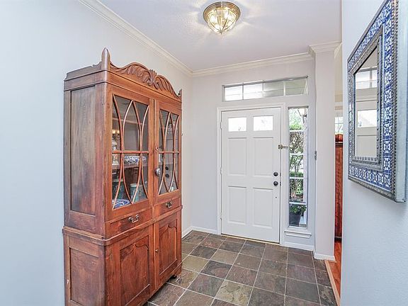Step inside to a large entry hall with tile floors.