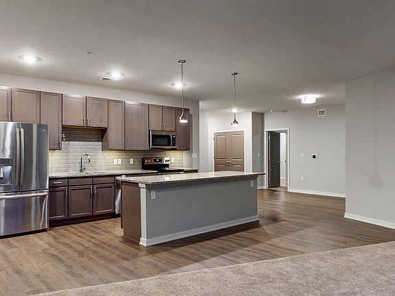 Our beautiful, modern kitchens have stainless steel appliances and plenty of counter space for all your cooking needs.