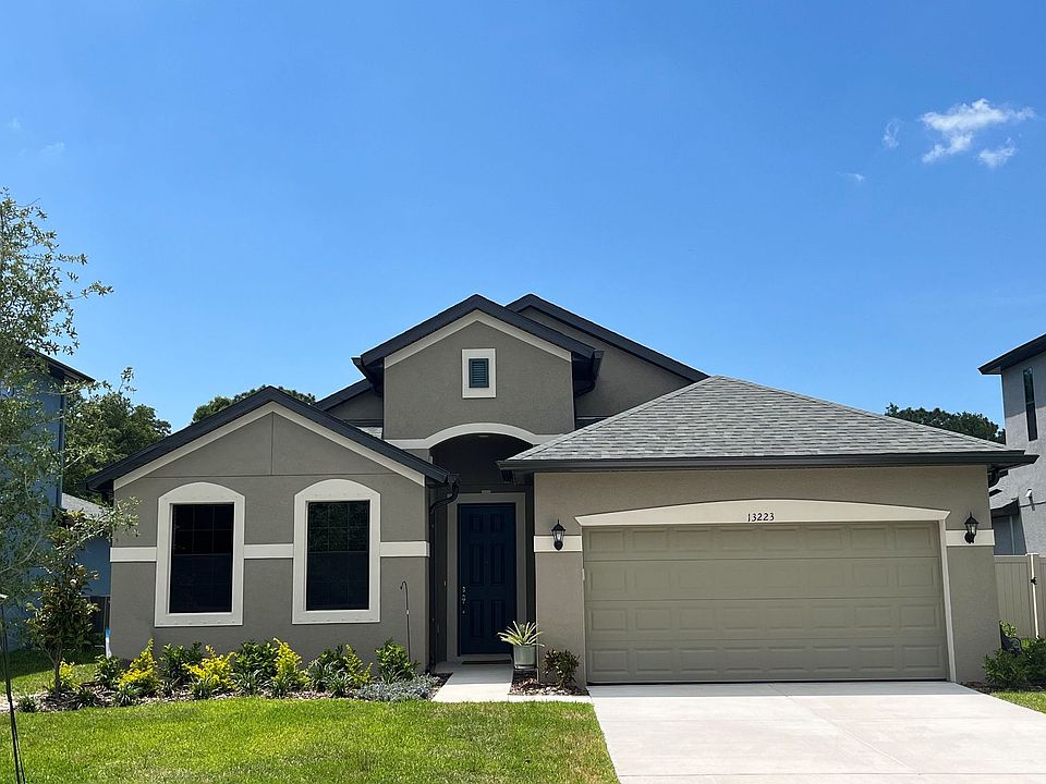 Sanibel new home plan french country elevation by William Ryan Homes Tampa