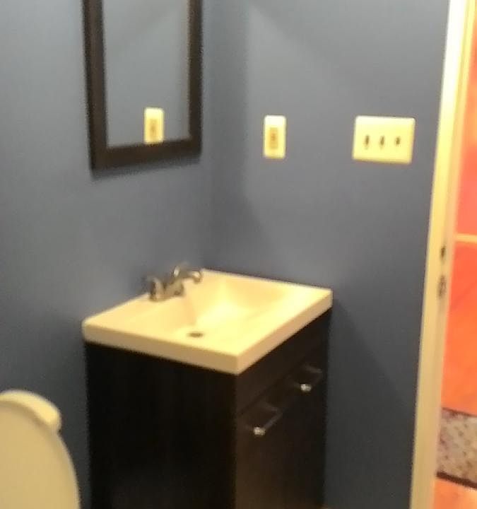Bath, new vanity and toilet.