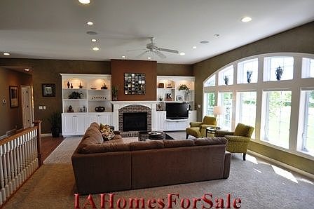 Family/Great Room with 10 ft high ceilings and surround sound