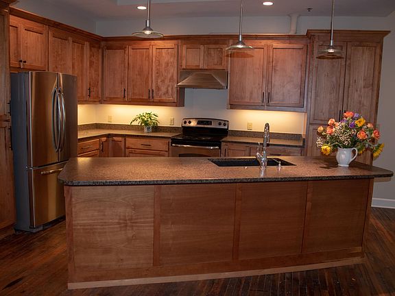 Lots of cabinets, closet space in this apartment! Kitchen with SS appliances, granite counters, and farmhouse sink with disposal!