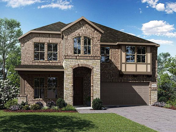 Elevation F is a two story tudor inspired brick and stone home design featuring large front porch an