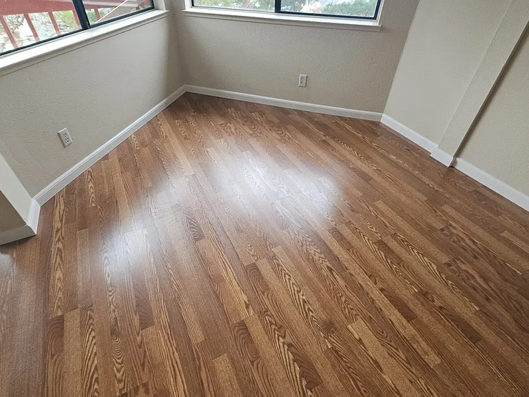 Brand New flooring throughout the entire unit. The pictures with carpet are old pictures.