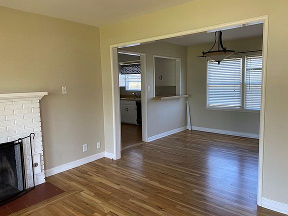 Dining Room and Fireplace in Living Room