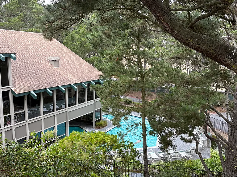 An aerial view of the pool and clubhouse