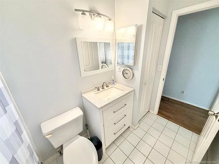 3486 SW Pindo Palm Ln — Photo 23