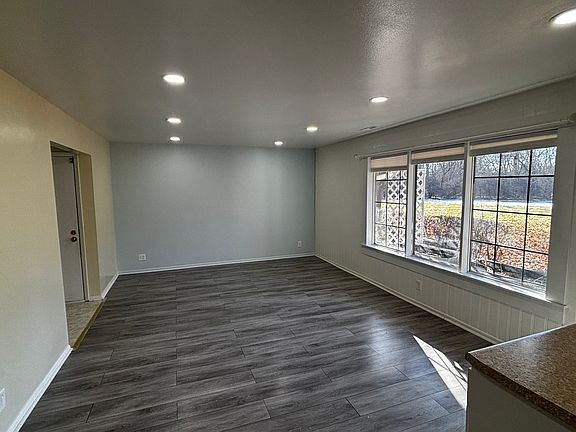Family room w/fresh paint. New recessed lights too!