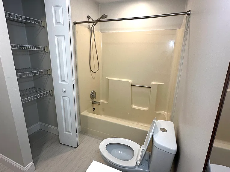 Main Upstairs Bath with large towel closet