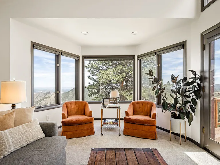 Panoramic windows with custom blinds for shade when needed