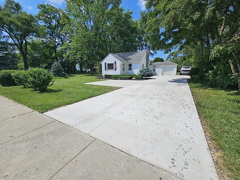 5555 W Utica Rd — Photo 1
