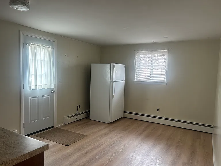 Large ,Bright Eat in kitchen with new counter top ,& sink