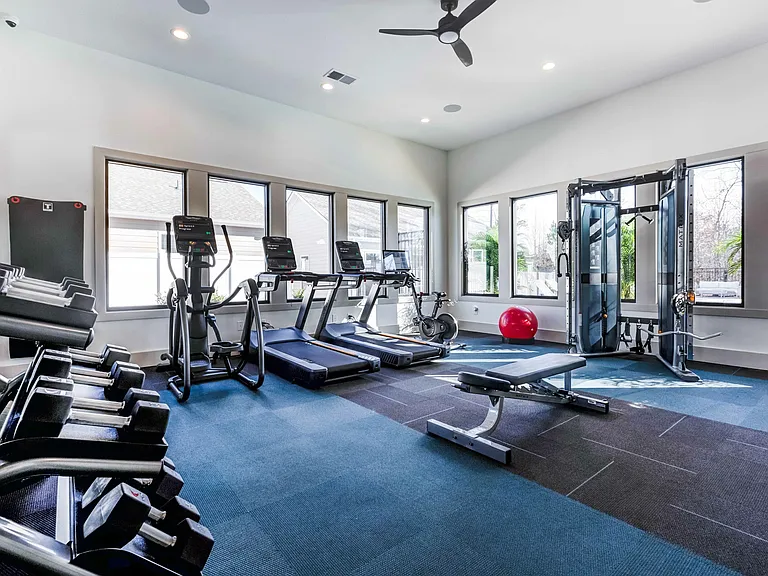 Fitness studio with spin bikes.