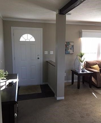 Step out that front door to a 10 ft by 25 ft deck with a great Country View. Inside is pretty nice t