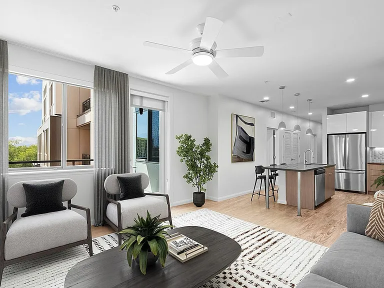 1 Bedroom Apartment Living Room and Kitchen at Sugarmont Apartments in Sugarhouse Utah