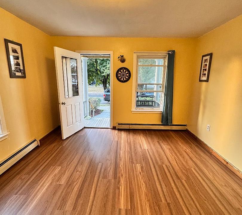 Good sized living room with new vinyl flooring.