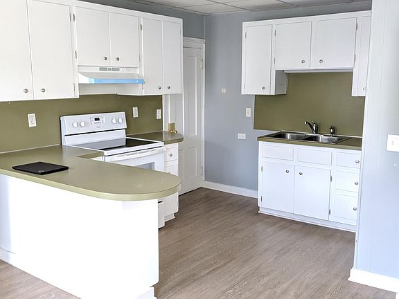 Eat-in kitchen with island seating.