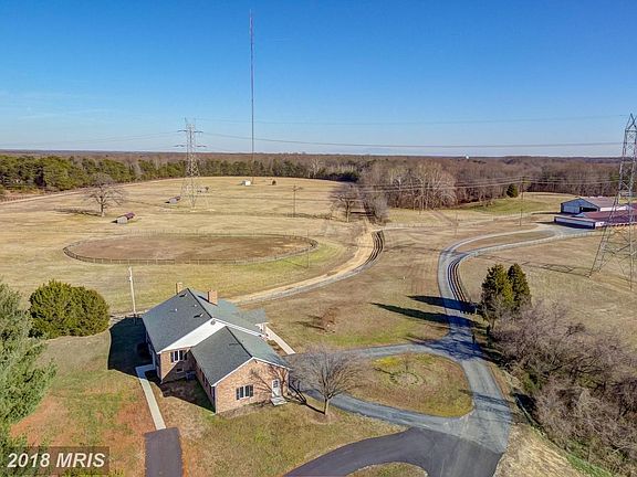 House, mile track, pastures, buildings