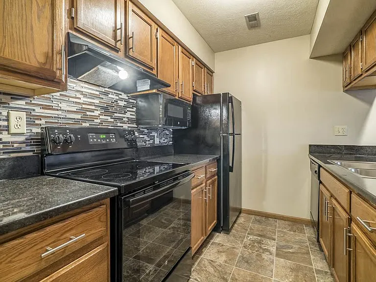Renovated homes feature sleek black appliances, updated cabinets, backsplash, and more.