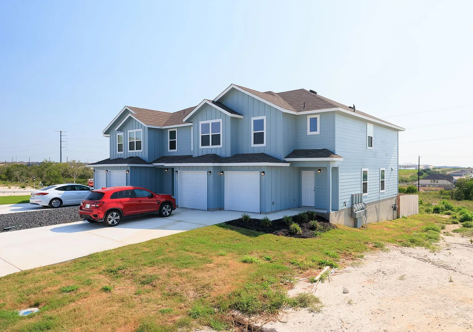 Like-New 3-Bedroom Townhome in Hunters Ranch | Private Yard + Garage — Photo 1