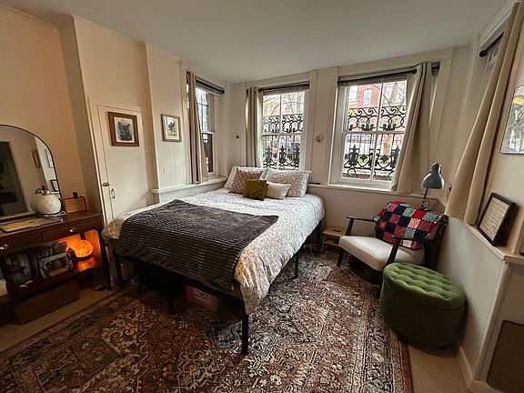 Living Area with large, east facing bay front windows