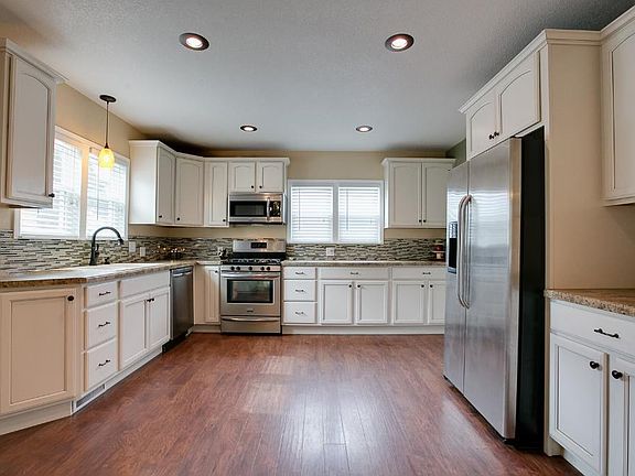 Stainless Steel Appliances & new cabinets in kitchen.