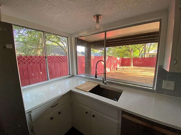 Kitchen and windows to back yard