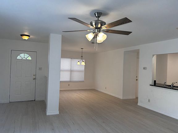Front Entry and dinning room, fresh paint and new flooring & Light fixture