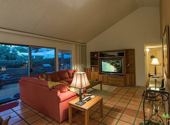 Saltillo pavers throughout living, dining and rear