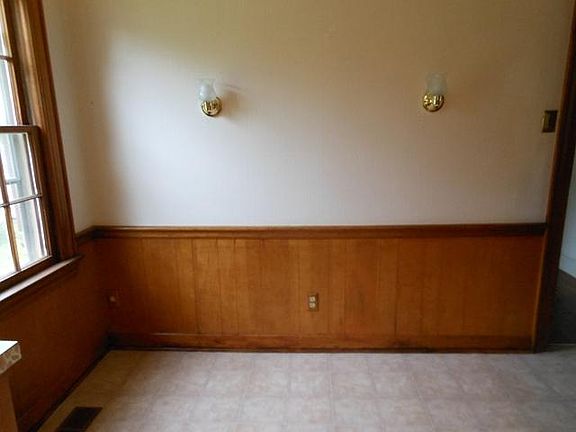 Eat-in kitchen. Window on left looks out into large grassy area reserved for wildlife.