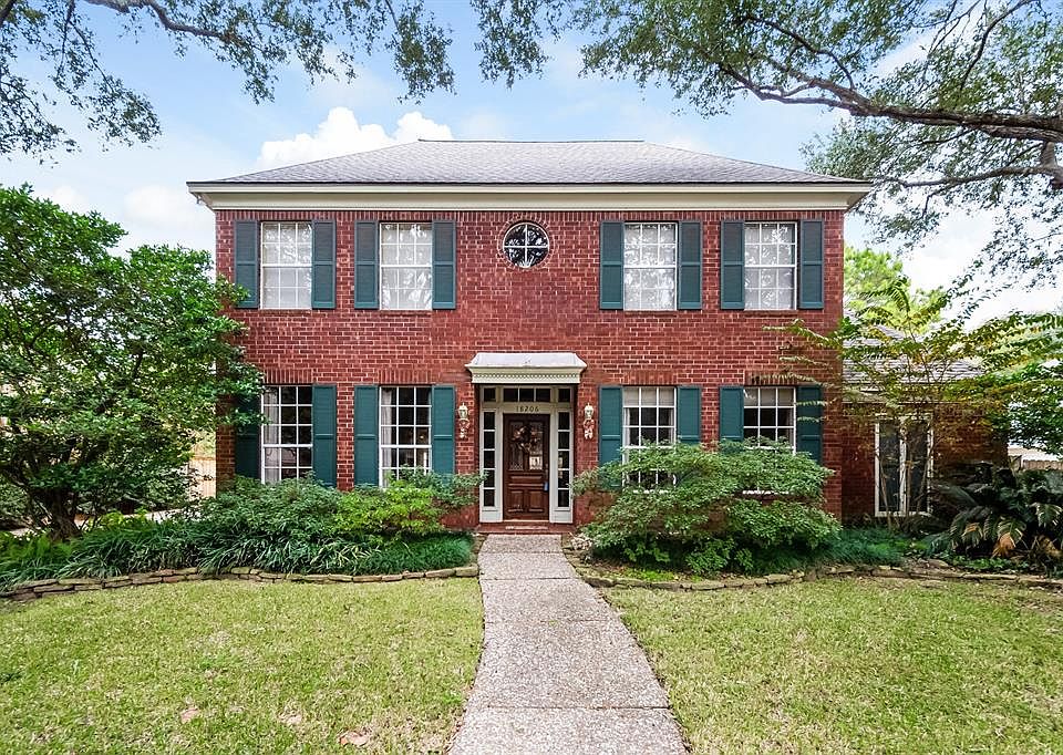 Traditional Red Brick Village Builder Home, built in 1988 with 3103 SF, 4/2.5/2; NEVER FLOODED!