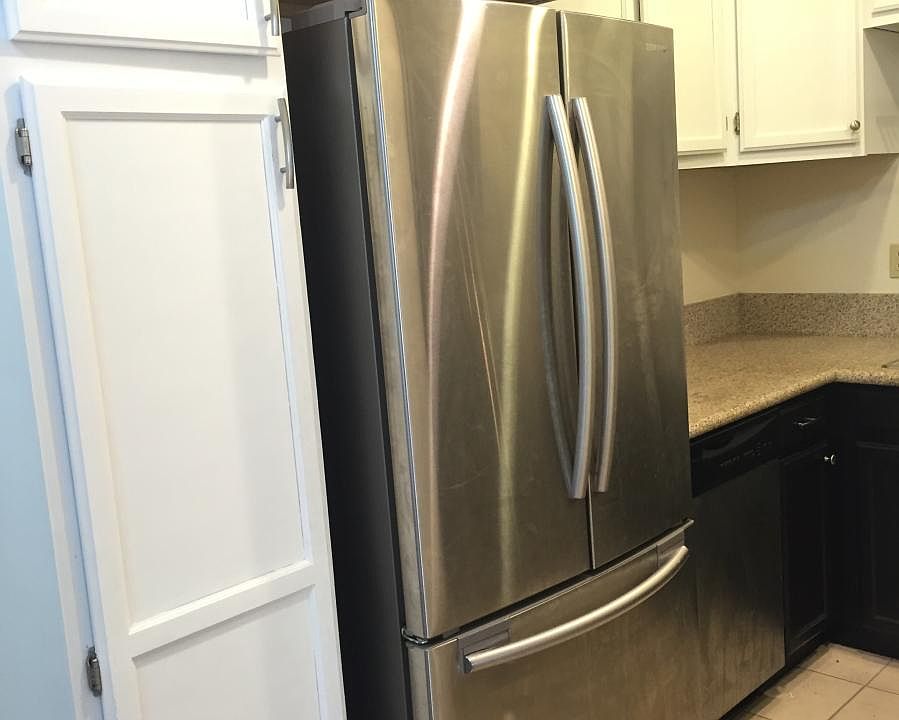 Stainless steel refrigerator and dishwasher included