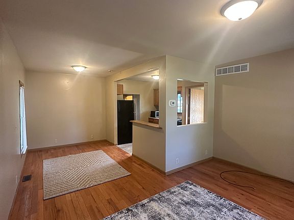 Living room and dining area towards kitchen