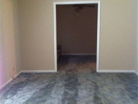Light & bright formal living area. Attractive neutral wall colors can be found throughout the home.