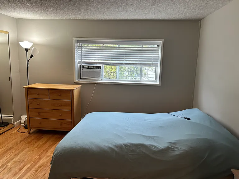 Good size bedroom fits queen bed easily.