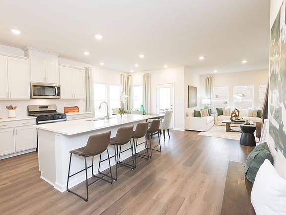 Enjoy tall windows that bring in light and an open floorplan that flows seamlessly.