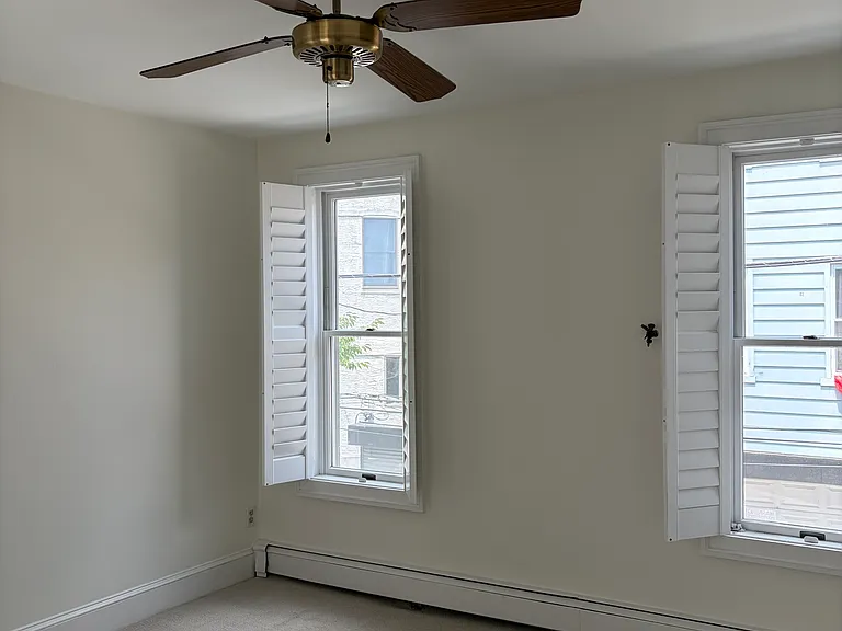 Primary bedroom comfortably fits a queen or king bed.