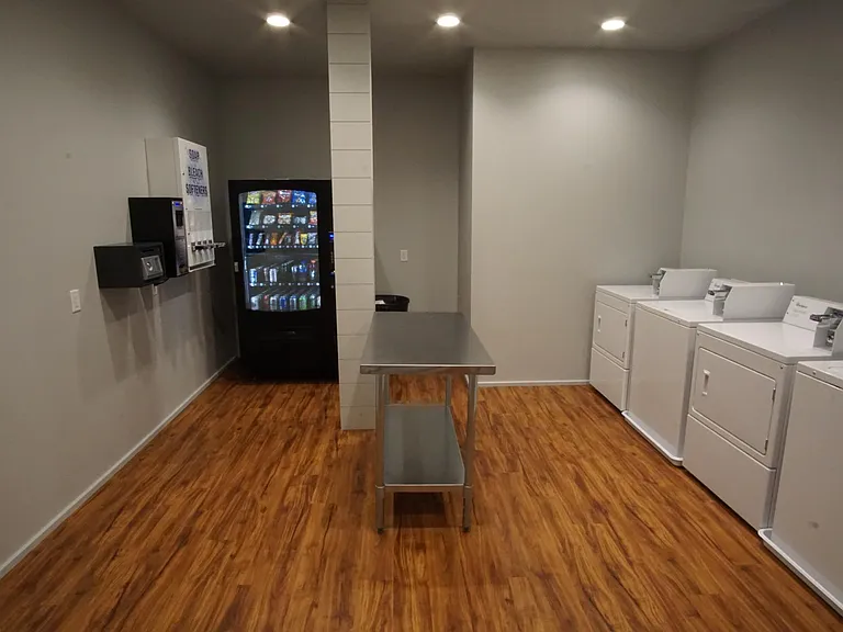 On Site Coin Operated Laundry Room & Vending Machine for Your Convenience!