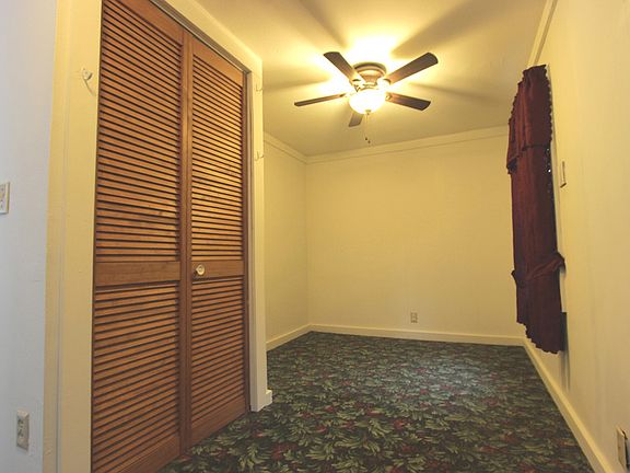 Main Level Bedroom, Ceiling Fan, and Patio Door