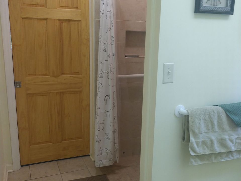 Bathroom view of large walk in shower.