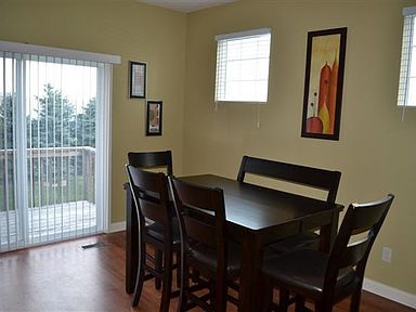 Dinette in kitchen with walk out deck