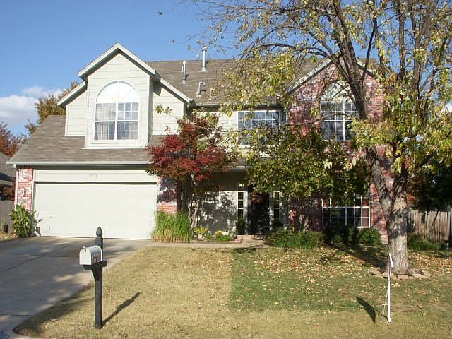 Exterior Front lg tree and beautiful landscaping