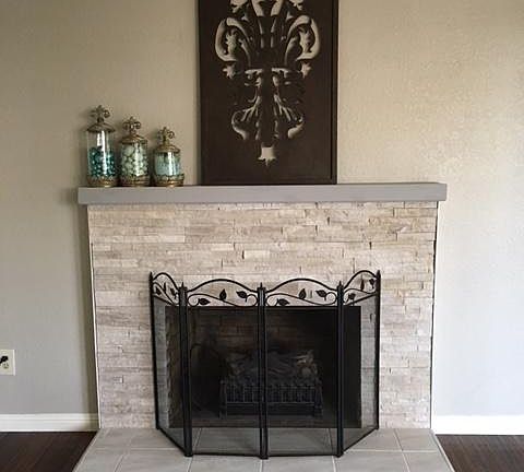 New bamboo floor with stacked stone fireplace