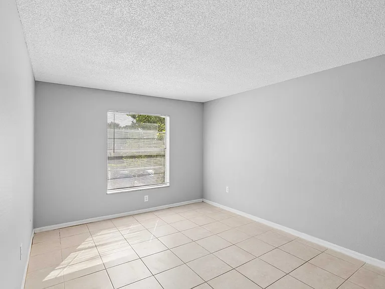 Step into the bright, spacious interiors of Clear Lake Palms Apartments, where modern design meets comfort. Enjoy tiled flooring, fresh paint, and ample natural light in this inviting living space. Schedule your tour today!