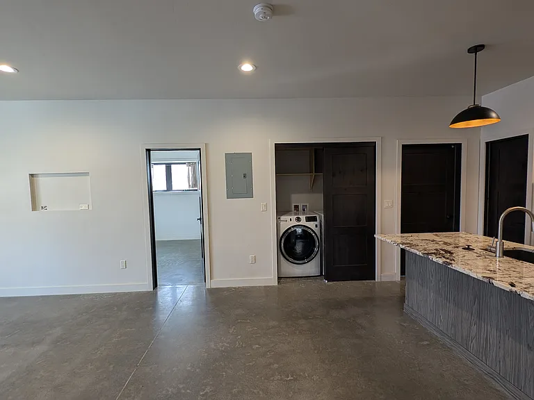Living and laundry area