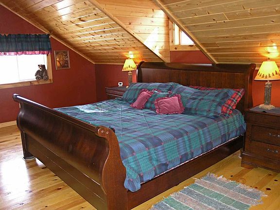 Gorgeous master bedroom with skylight.