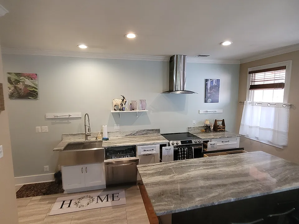 Open and spacious layout. Stunning kitchen. Light and bright.... fully stocked hlgh end appliances.