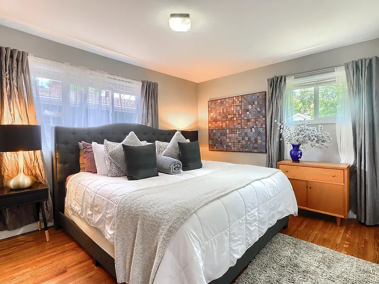 Master Bedroom - Main Floor with adjoining half bathroom