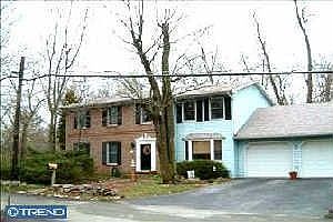 Brick Front with Light Blue Vinyl Siding